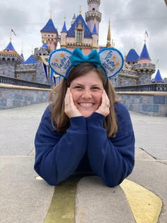 Laura Carter a disney travel agent from the vacation wizards posing at Disney