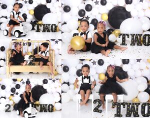 twins with black gold and white setup at their second birthday photoshoot 