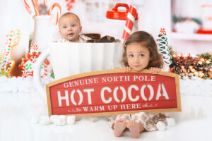 siblings pose at their hot chocolate mini session