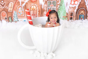 girl poses at a hot cocoa photoshoot